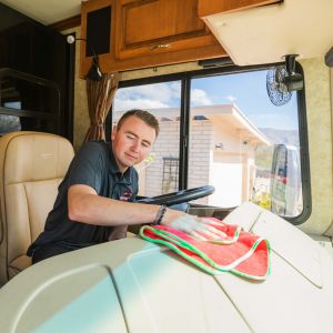 Ricky cleaning boat